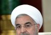 Hassan Rohani, Hodschatoleslam und Präsident der Islamische Republik Iran, kriecht zu Kreuze